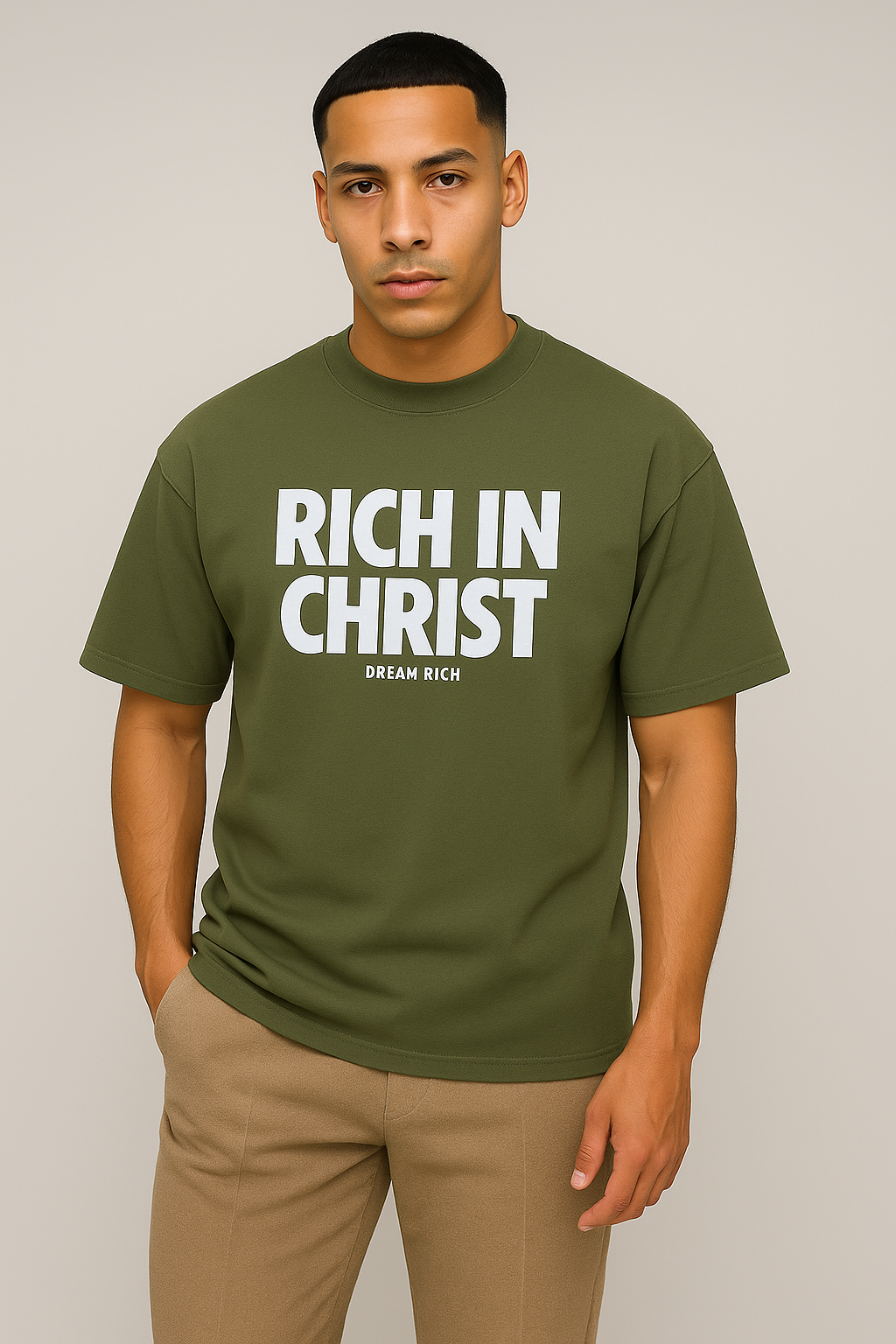 RICH IN CHRIST Military Green Tee – “Battle-Tested Belief”